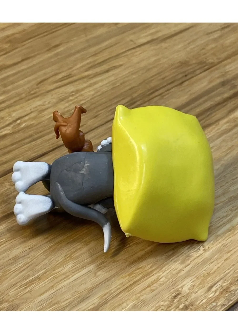 Warner Bros. Gray Tom & Brown Jerry with Yellow Cheese Bed Figurine